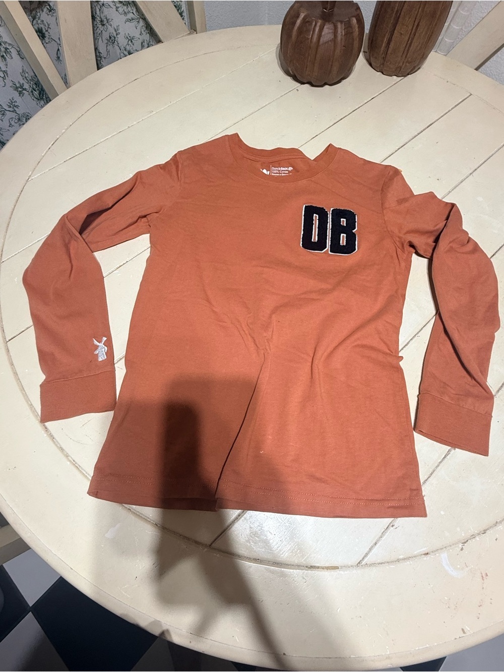 Dutch Bros Long-Sleeve Tee in Rust Orange with Patch